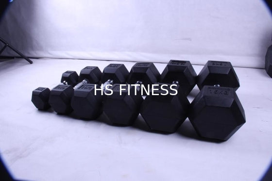 黒い体育館の試しの付属品はボディー ビルのためのゴム製上塗を施してある六角形のダンベルを固定した
